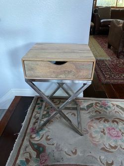 Really nice night stand end table with chrome  and has a drawer