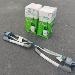 Two Garden Pump Sprayers And Two Sprinklers 
