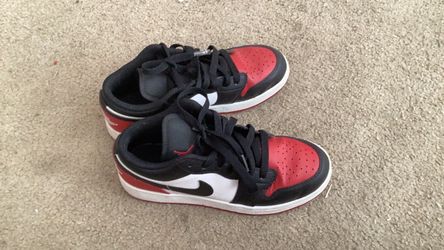 Red black and white Air Jordan’s