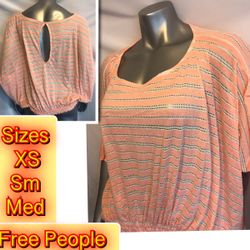 Brand new Free People Coral Small opening in the Back Blouse