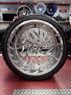 24X14 XTREME FORGED WHEELS W/33X14.50R24 A/T TIRES