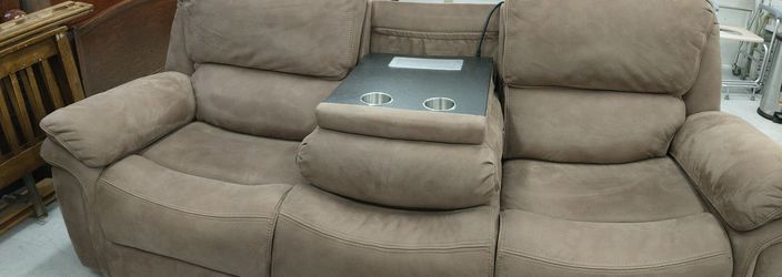 Theater loveseat/sofa with 2 recliners & electrical / phone charging ports. Sit back & watch in style & comfort. Great like new!