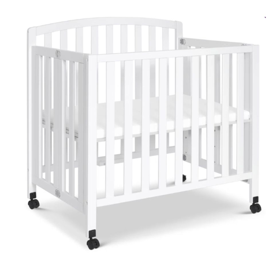 DaVinci Dylan Folding Portable 3-in-1 Convertible Mini Crib and Twin Bed in White, Greenguard Gold Certified