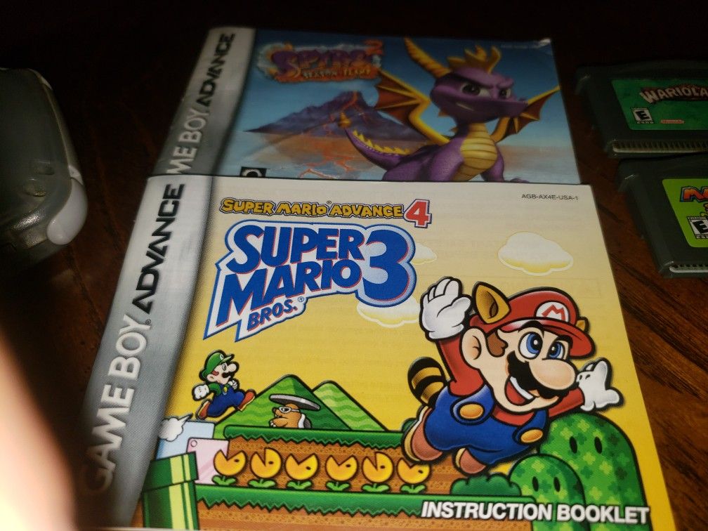 Original Nintendo Gameboy Advance Bundle AGB 001 Glacier Purple Clear Mario And Luigi Superstar Saga Wario Land 4 Super Mario Bros 3 Spyro Fortress