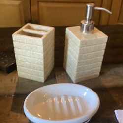 Soap dispenser with matching toothbrush, holder, and soap dish