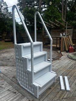 Gently used  above ground in-pool steps.