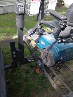 Amigo electric grocery scooter with hydraulic lift carrier