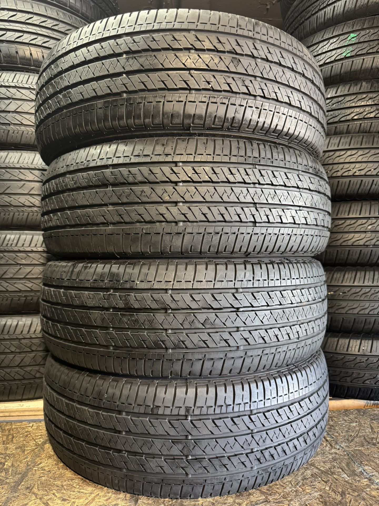 4 BRIDGESTONE TIRES 205/65/15 FREE MOUNT AND BALANCE