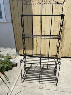 Foldable metal organizer.