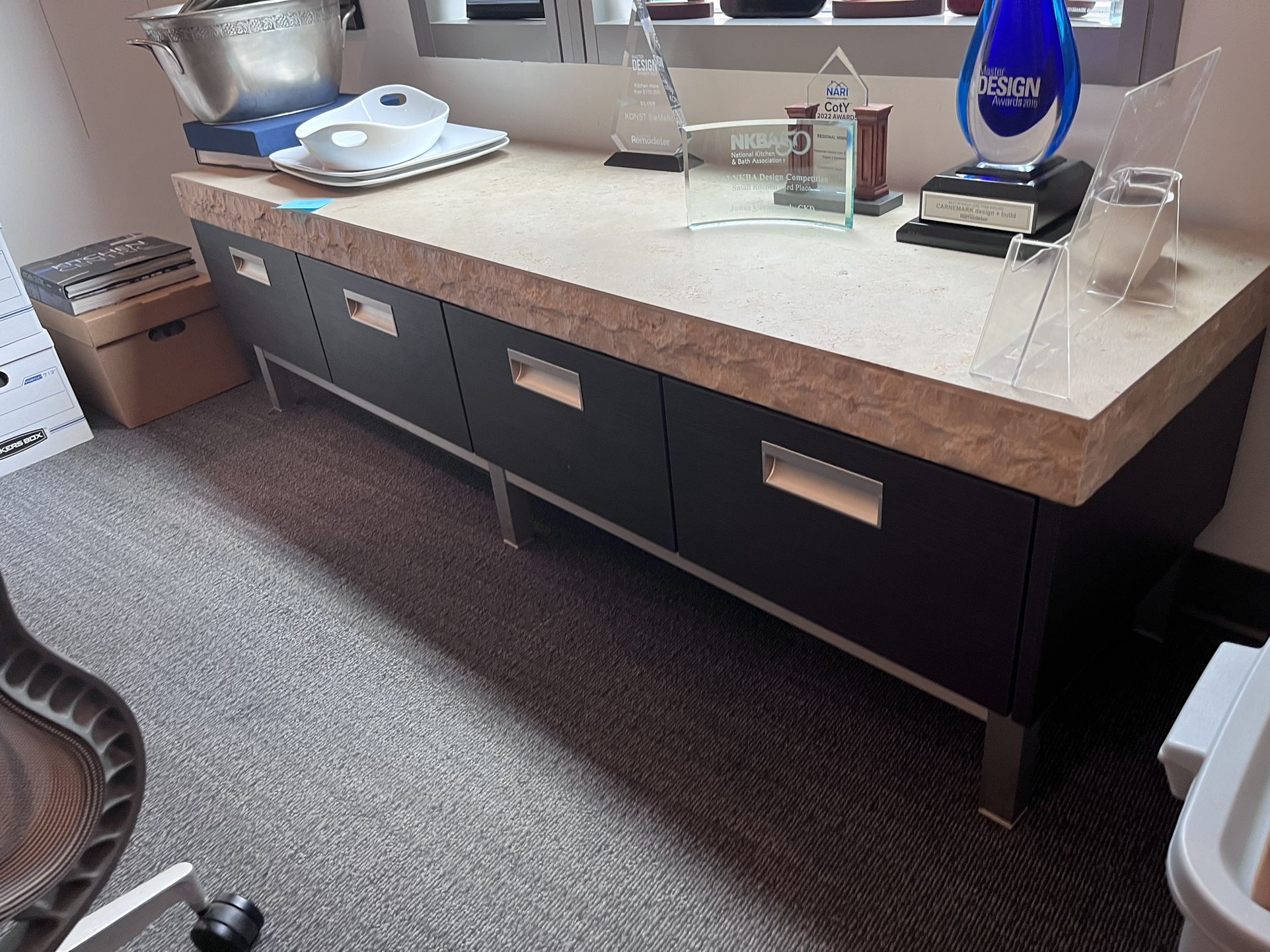 Limestone console table with wood veneer cabinets