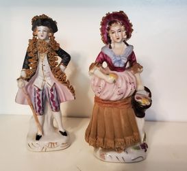 2 vintage porcelain statues