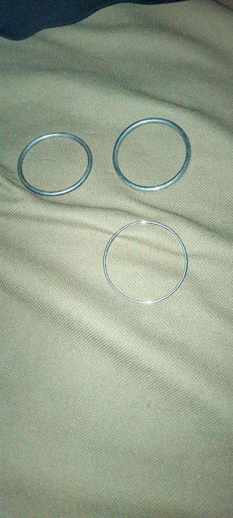 Three Metal Bracelets