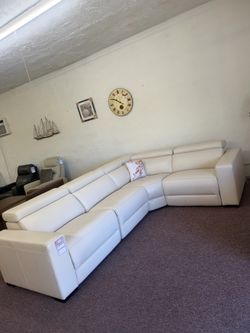Nevio - 4 pc leather sectional with two power recliners
