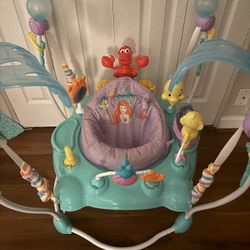 The Little Mermaid Sea of Activities Baby Activity Jumper with Interactive Toys, Lights & Music with Disney Princess Ariel, 6-12 Months (Blue)