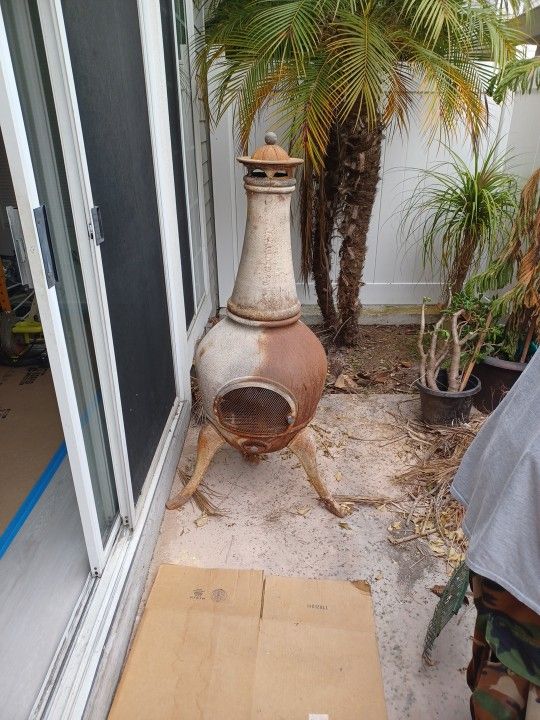 Cast iron wood burning stove for outside