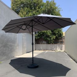 New in Box $130 Large Double Sided Outdoor (15ft Umbrella and 65lbs Plastic Base set) Colors Red/Gray 