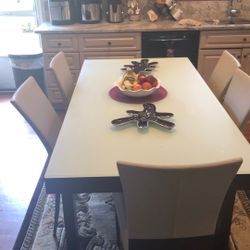 Table with six chairs and dresser