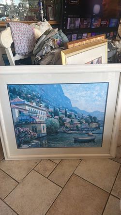 Lago Maggiore (depicting a colorful Italian lakeside town with mountains and moored boats