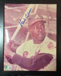 Hall of Famer Hank Aaron features a signature certified by Beckett Authentication Services
