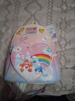 Collectable Disneyland lounge fly  and hello kitty and friends care bears backpacks never used !!