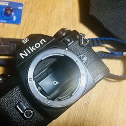 Nikon Em Fil 35mm Camera ,body Cap ,strap ,new Double Battery , Pouch 