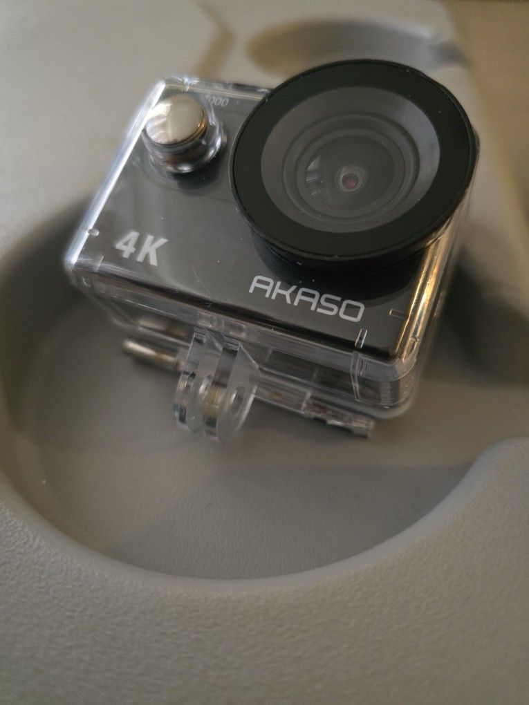 AKASO EK7000 4K Action Camera + Accessories – $50 (Like New)