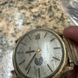 Omega vintage watch face and band