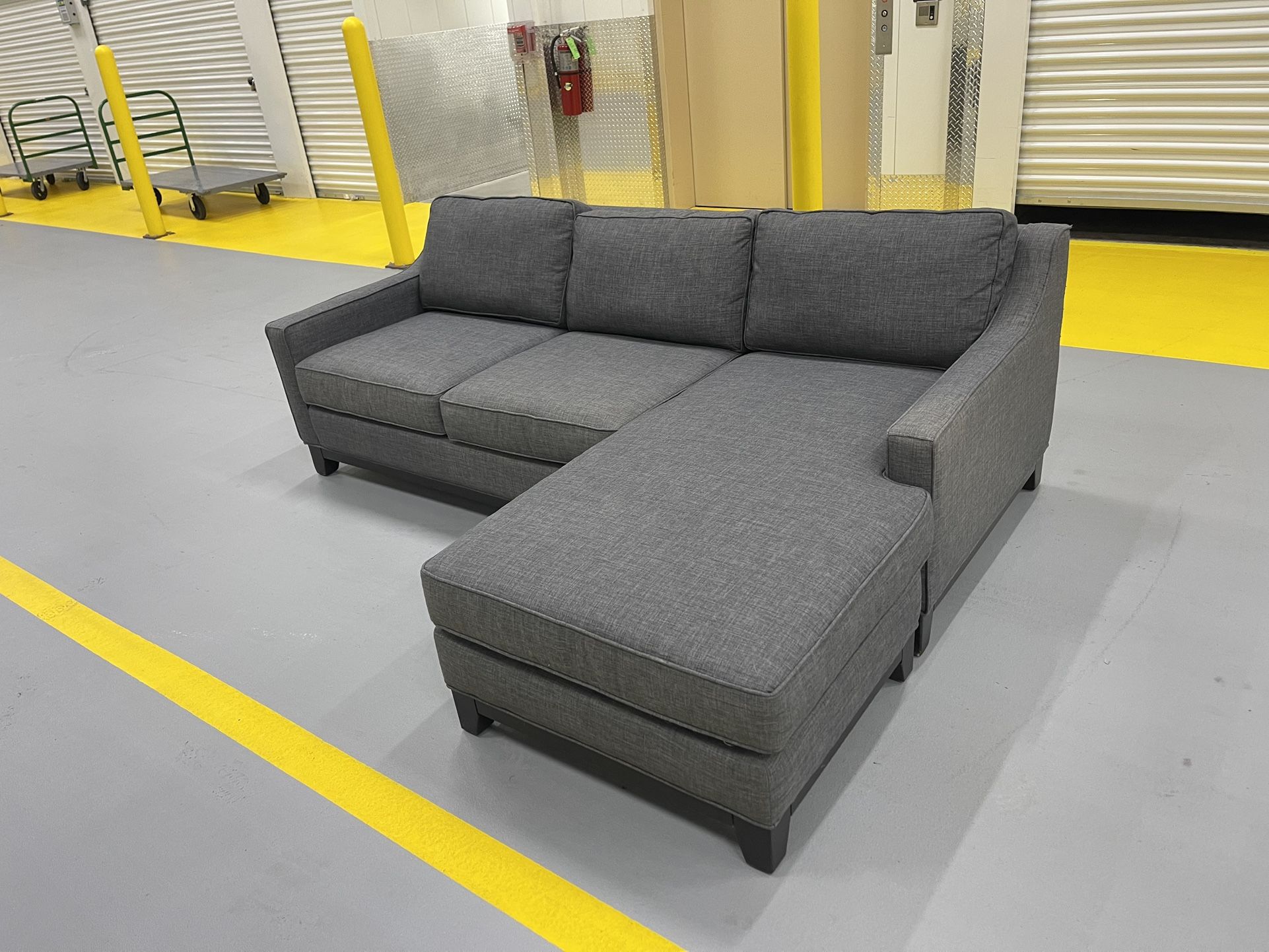 Gray Couch With Reversible Chaise