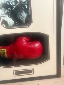 Autographed ali and Malcom X.