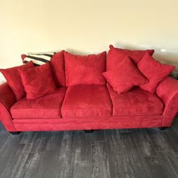 Red Sofa with Pillows