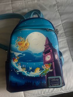 The Loungefly Disney Peter Pan Nighttime Flight Glow-in-the-Dark Mini Backpack