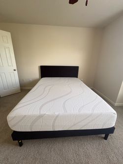 Black headboard, bed-frame and queen mattress