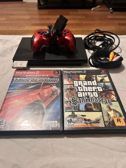 Ps2 slim with 2 games