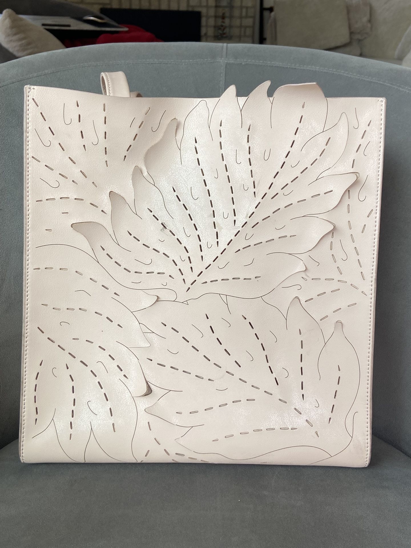 BANANA REPUBLIC Light Pale Pink Leather Perforated East West Tote Handbag. Preowned in very good condition. Small mark on handbag strap. Please see ph