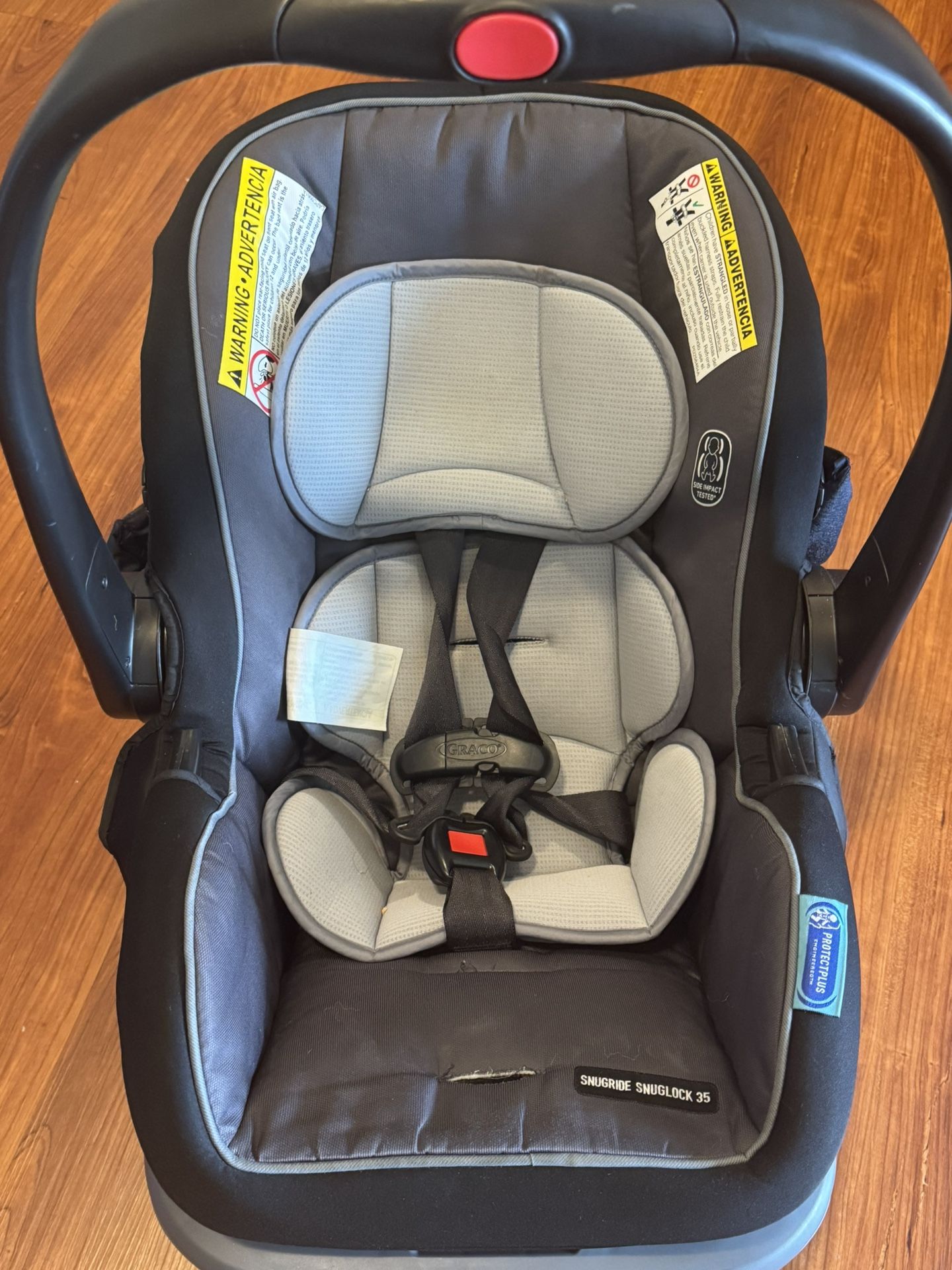Graco SnugRide SnugLock 35 Infant Car Seat + Free Infantino 4-in-1 Baby Carrier