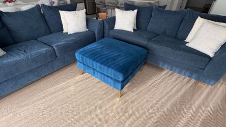 the two sofas and the pouf