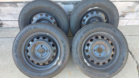 185/65 R14 steel wheels and tires