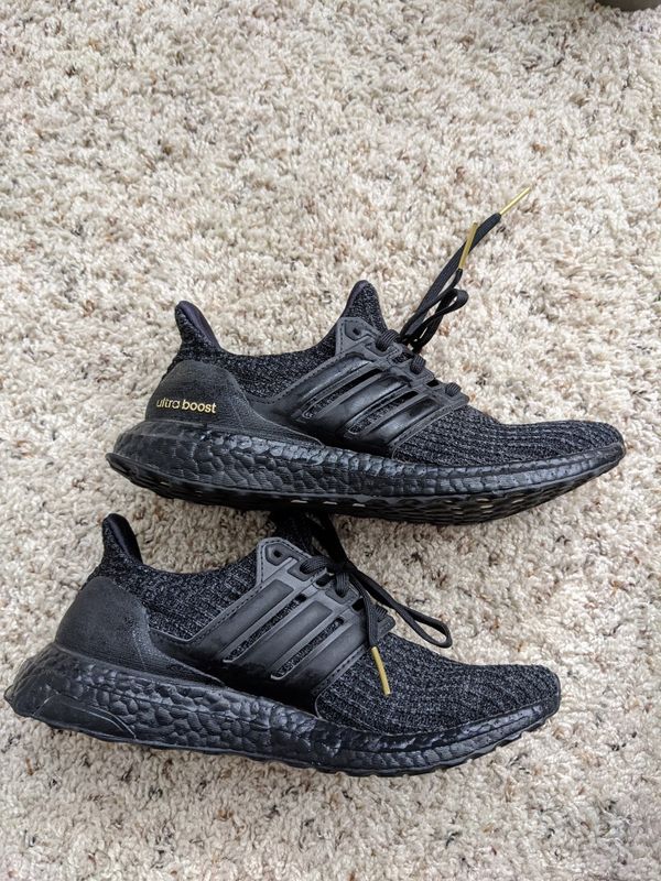 Adidas ultra boost triple black and gold for Sale in San Diego, CA - OfferUp