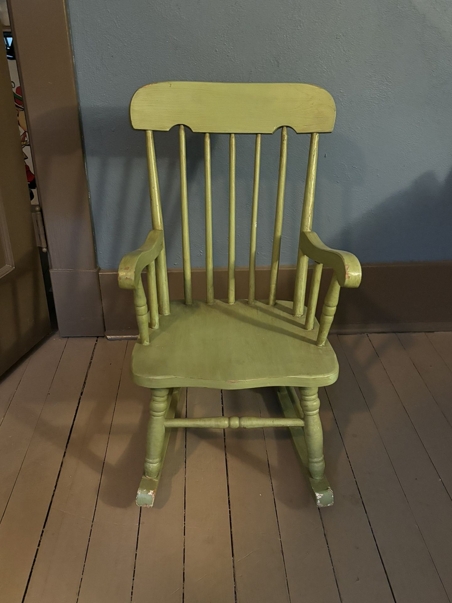 Vintage children’s wooden rocking chair