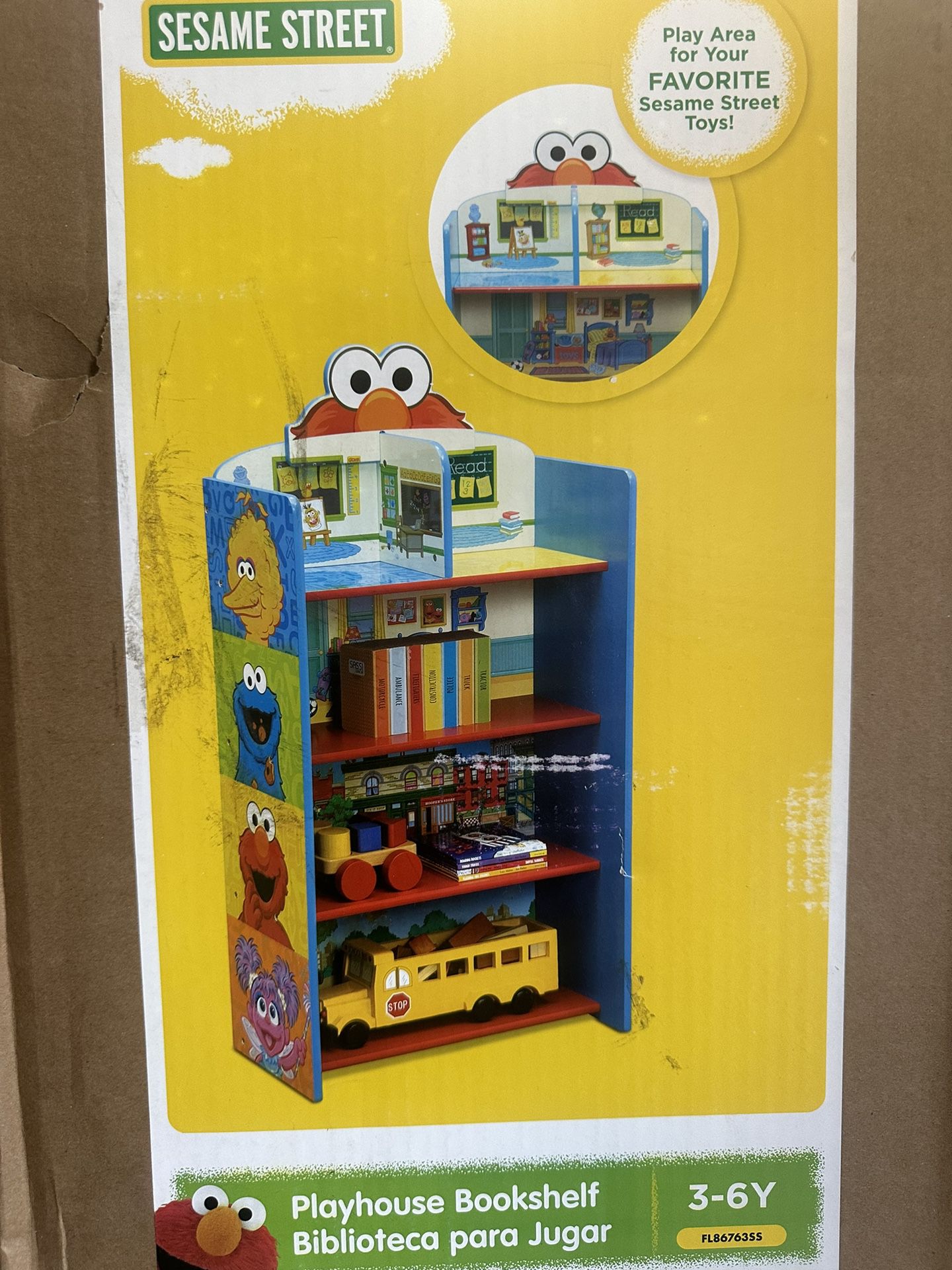Elmo, bookshelf, and playhouse