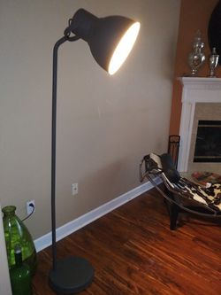 Floor lamp, grey. Gives lots of light In very good condition!!