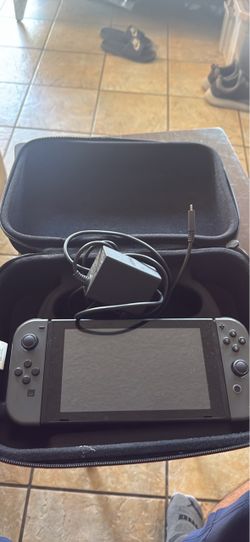 Nintendo Switch with Carry Case and Charger