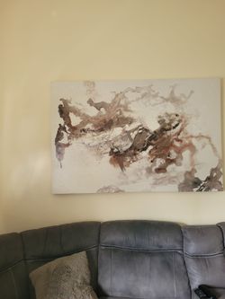 Couch and center piece with rug and rocking chair.  Electric recliners
