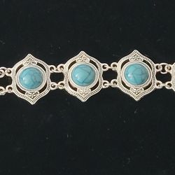 Fashion Style Silver Tone & Faux Turquoise Ornate 6 Panel Adjustable Bracelet. Add a touch of vintage charm to your fashion jewelry collection with th