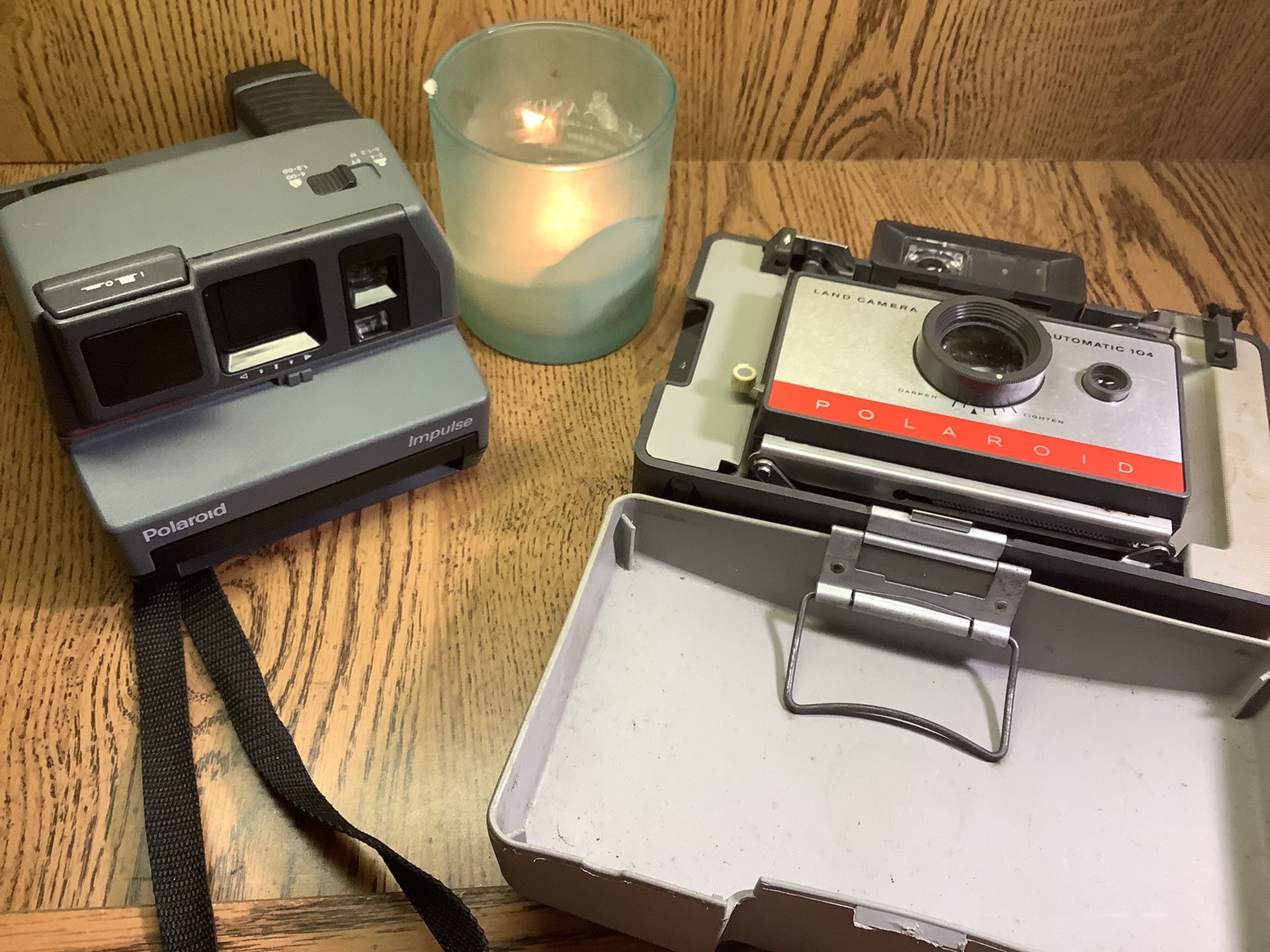Two vintage Polaroid cameras