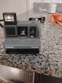 Polaroid impulse camera