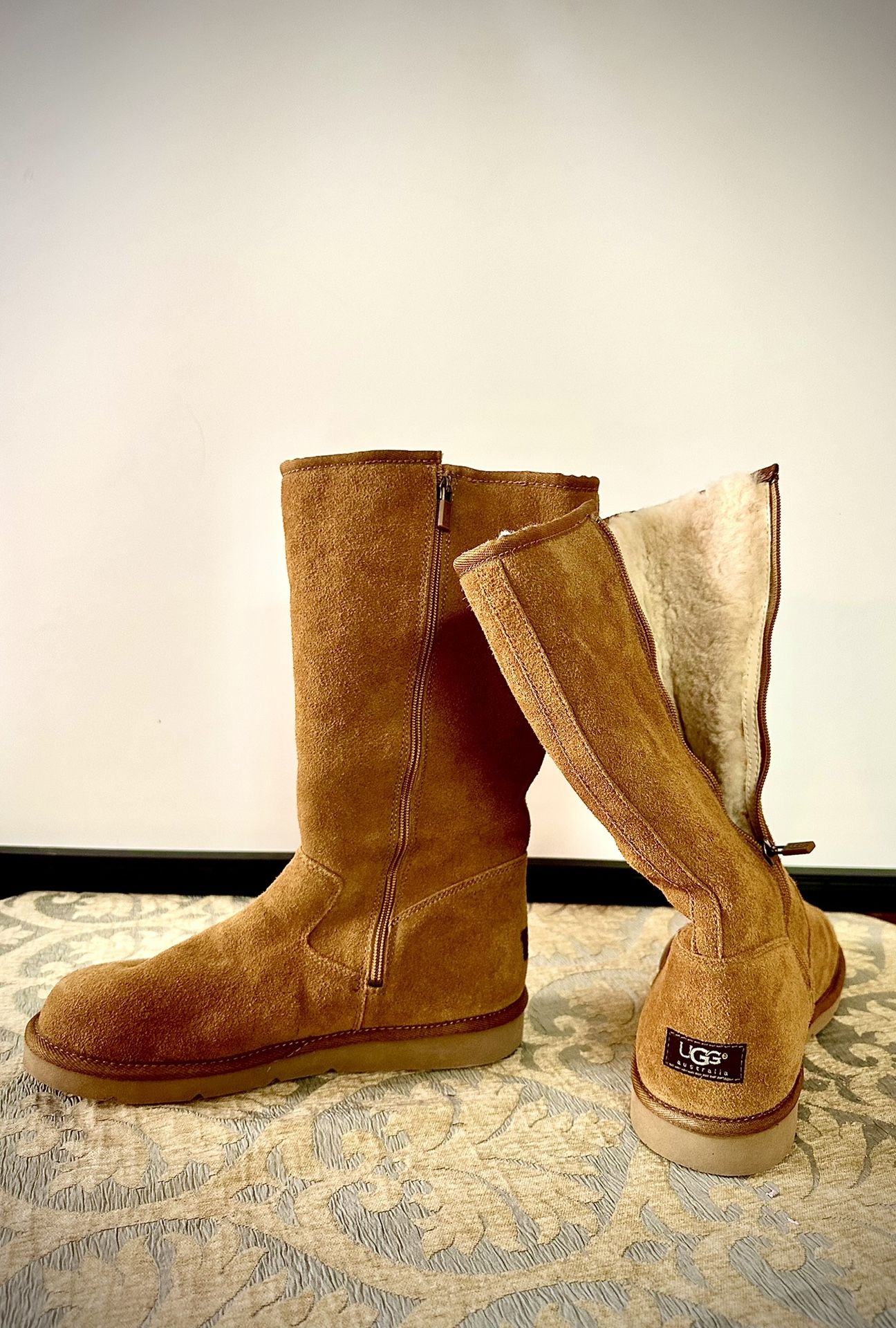 Tall UGG Australia boots size 12 new Never worn new original UGG Australia boots light brown Size 12