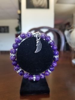 Pretty Purple Bracelet with Wing Charm
