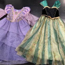 TWO DISNEY GIRLS COSTUMES RAPUNZEL AND ANNA FROM FROZEN SIZE 9/10