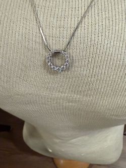 Danecraft sterling silver round pendant with chain and earrings. CZ stones